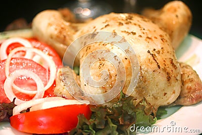 Roast chicken with fresh tomato salad