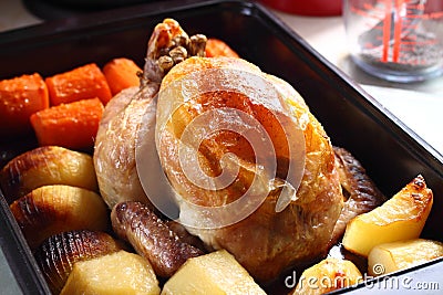 Roast chicken in tray A