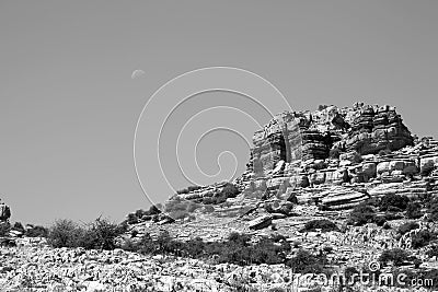Rock formation in El torcal with the moon in the s