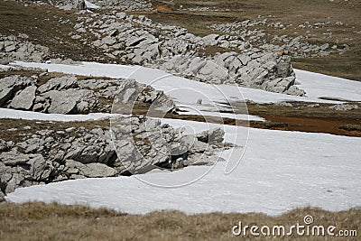 Rock with snow on the Plateau
