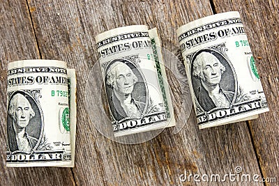 Rolled up dollar bills