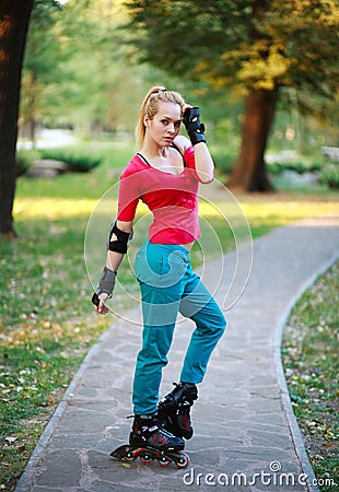 Roller sporty girl in park, woman outdoor fitness