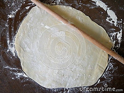 Rolling pin and homemade pie dough