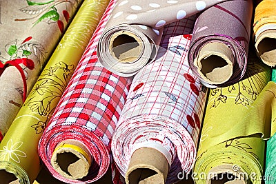 Rolls of plastic sided fabric