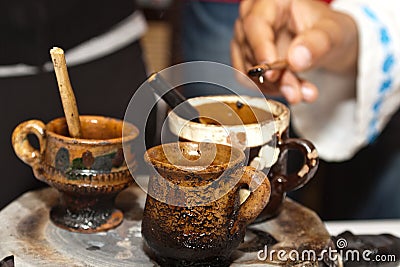Romanian traditional clay cups with hot wax