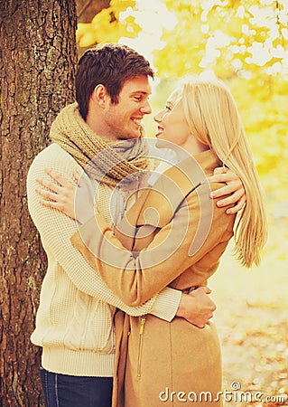 http://thumbs.dreamstime.com/x/romantic-couple-kissing-autumn-park-holidays-love-relationship-dating-concept-42709235.jpg