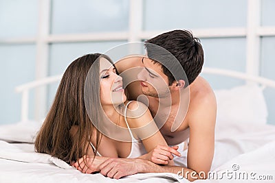Romantic scene in bedroom