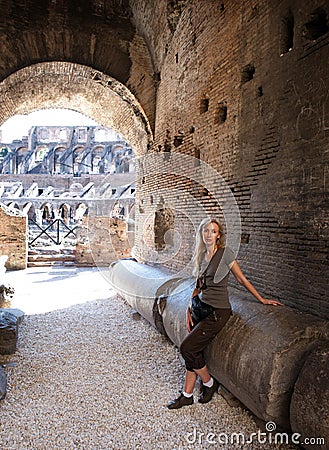 Rome. The tourist on ruins of the ancient Collosseo