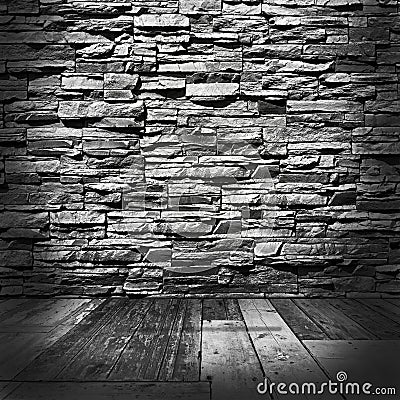 Room with stone walls and wooden floors