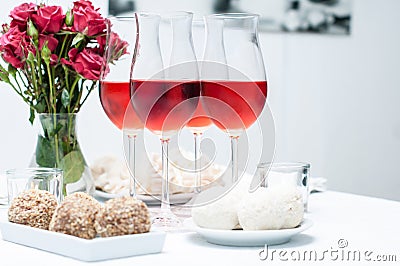 Rose wine in glasses, home party