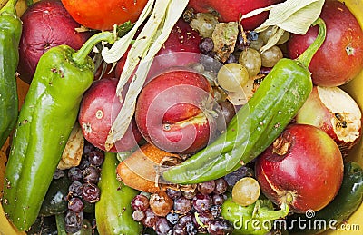 Rotten fruit and vegetables in a bowl