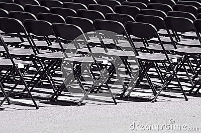 Row of black empty chairs
