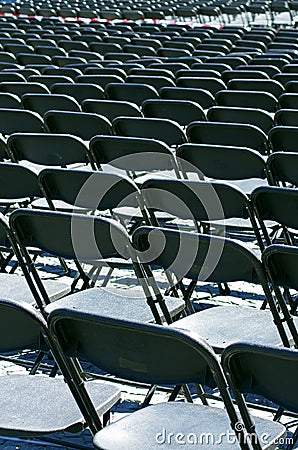 Row of black empty chairs