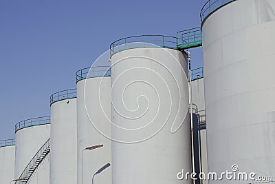 Row of oil storage tanks