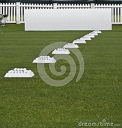 Row of Practice Balls, Blank Signage Boards