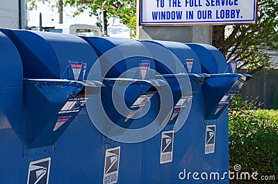 Row of United States Postal Service mailboxes