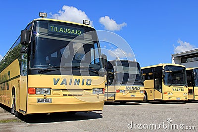 Row of Yellow Coach Buses