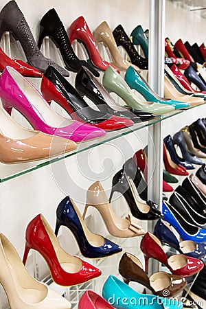 Rows of beautiful women s shoes on store shelves