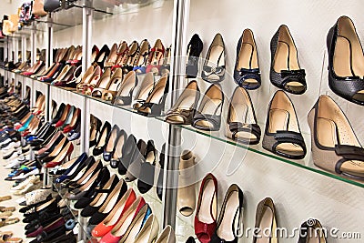 Rows of beautiful women s shoes on store shelves