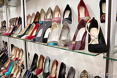 Rows of beautiful women s shoes on store shelves