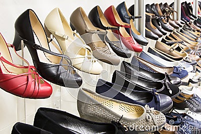 Rows of beautiful women s shoes on store shelves