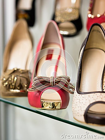 Rows of beautiful women s shoes on store shelves