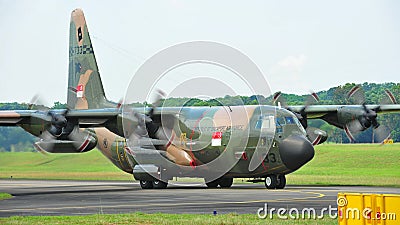 RSAF C-130 military transport plane taking off