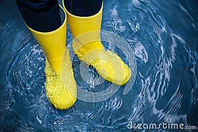 Rubber boots in the water