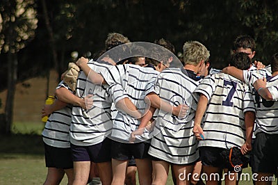 Rugby team huddle