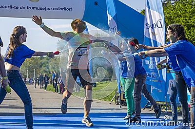 Runner covered with blue powder