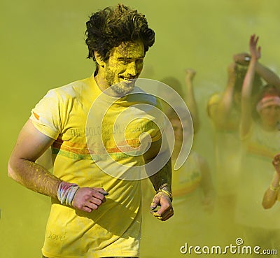 Runner covered in yellow paint