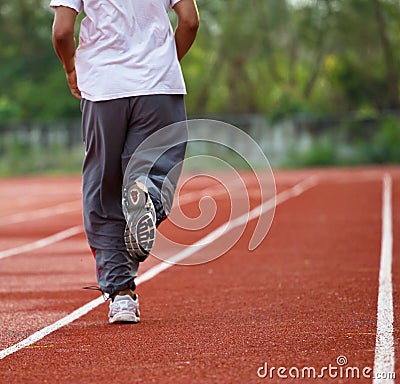 Runner running in the light of evening