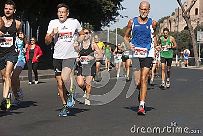 Runners foreground and several runners in background