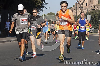 Runners foreground and several runners in background