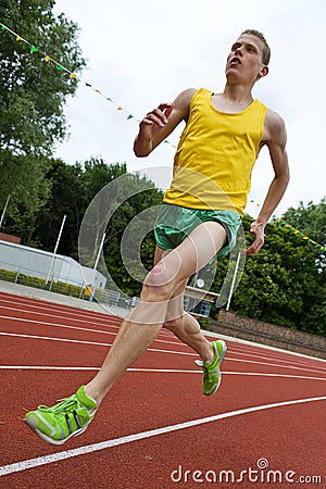 Running athlete in mid-air