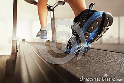 Running in a gym on treadmill
