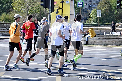 Running people at the marathon