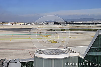 Runway and buildings at Barcelona Airport. Spain