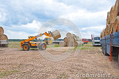 RUSSIA,BRYANSK-SEPTEMBER 6:Rural landscape with the agriculture machines on September 6,2014 in Bryanskaya Oblast, Russia.