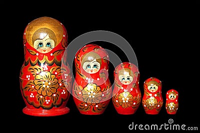 Russian dolls isolated on black