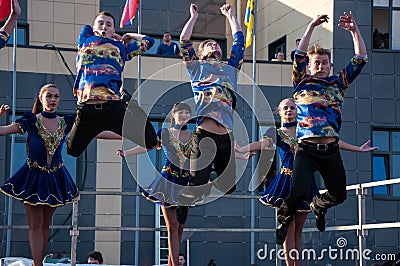 Russian folk dance is performed in the open sky