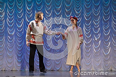 Russian man and woman in national costume