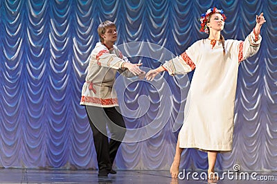 Russian man and woman in national costume