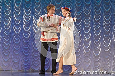 Russian man and woman in national costume