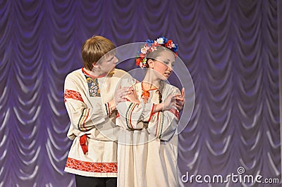 Russian man and woman in national costume