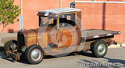 Rusted out early 1940s Ford flat bed pick-up truck