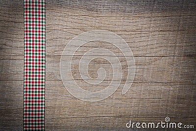 Rustic vintage country style wooden background with red bow for