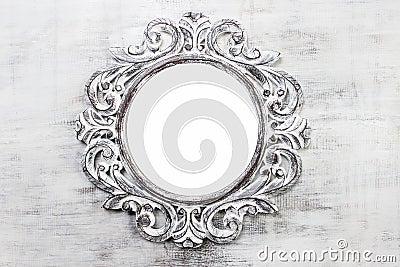 Rustic wooden round frame on grey background