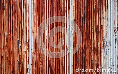 A Rusty Corrugated Metal Fence - close up - zinc