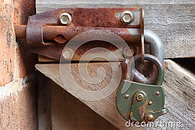 Rusty latch with padlock
